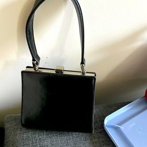 Black small leather purse. 9 West
